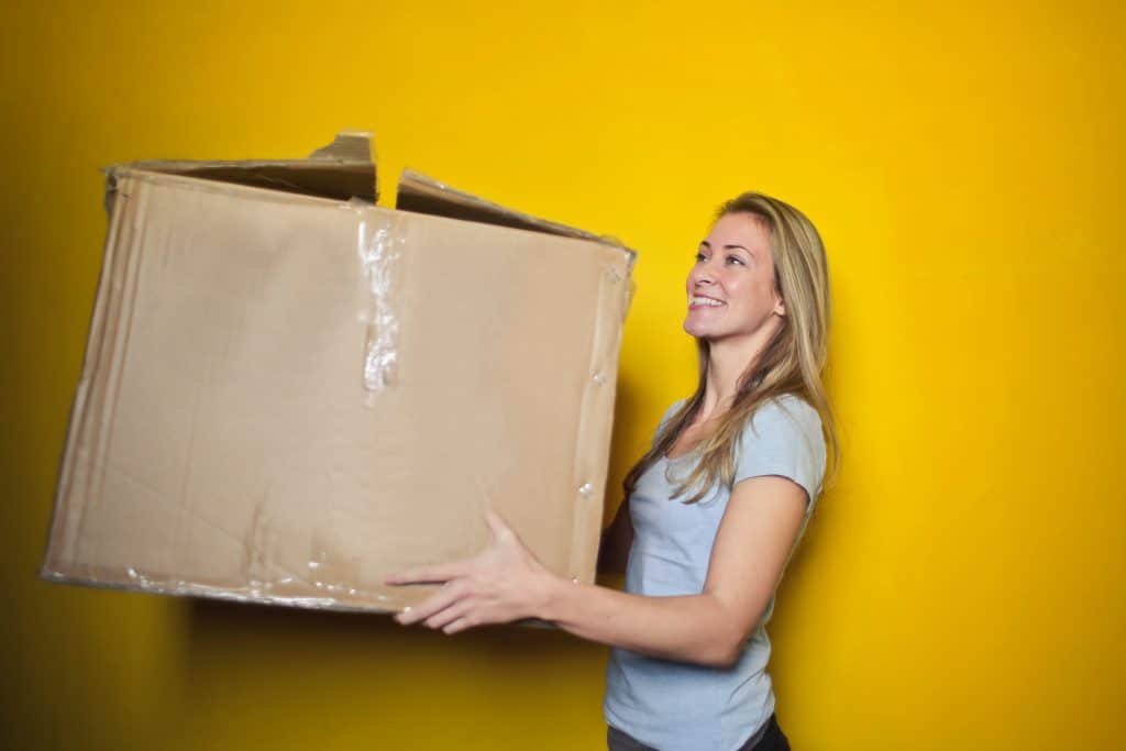 Girl Getting ready for her move by packing